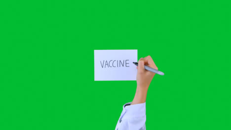 Doctor-Escribiendo-Vacuna-En-Papel-Con-Pantalla-Verde